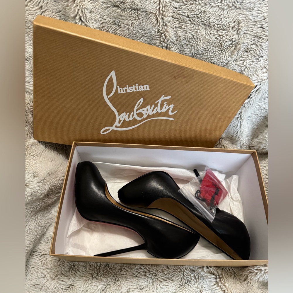 Christian Louboutin heels.